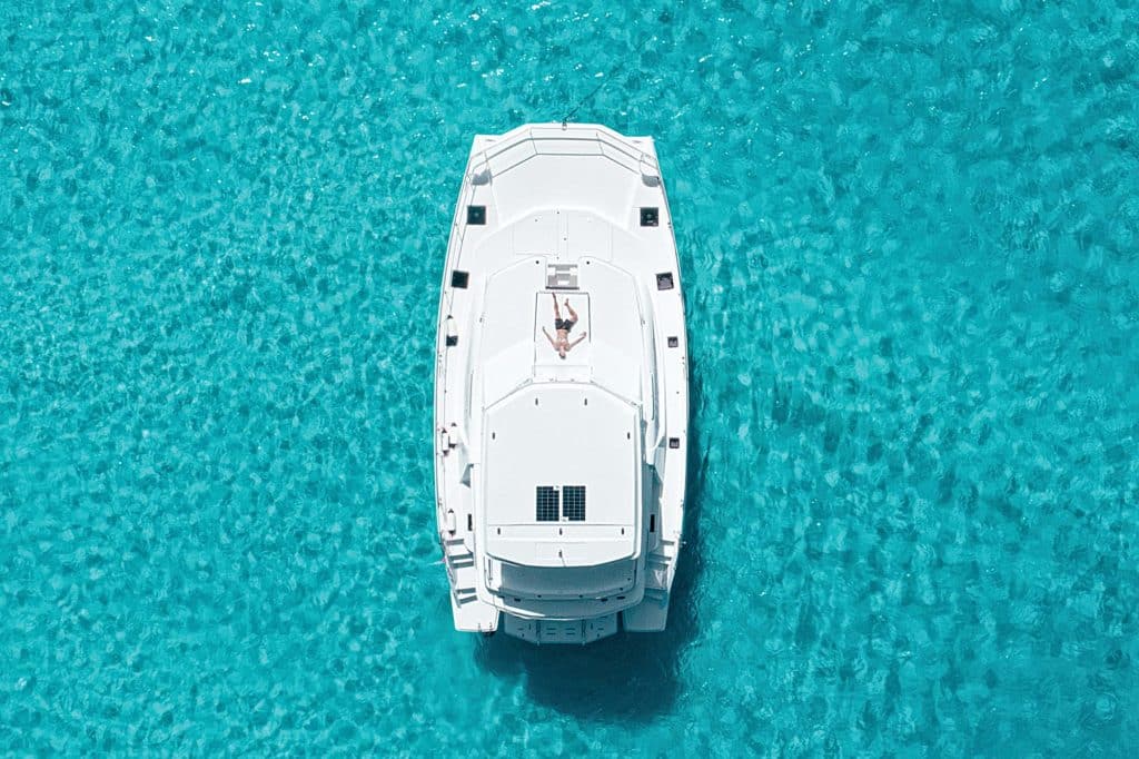 catamaran on turquoise water from above