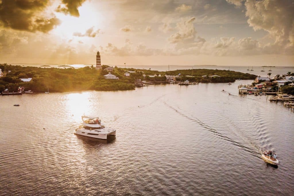 Catamaran in a bay during sunset