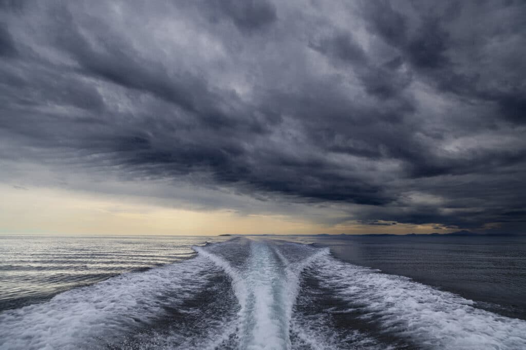 dark sky behind boat